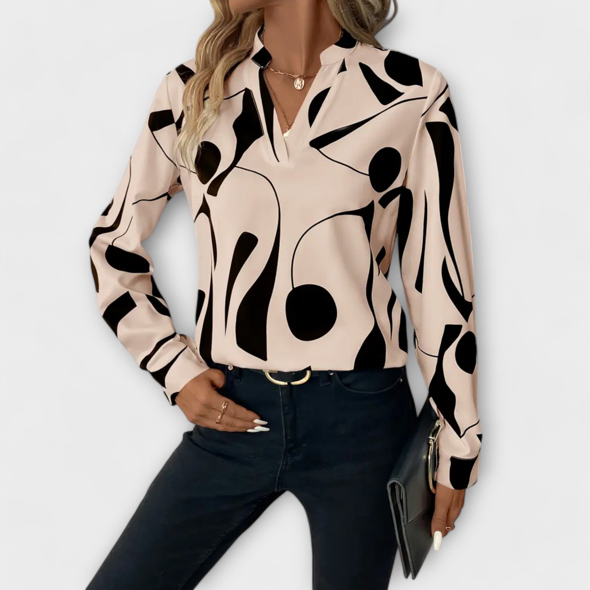 Elegant long-sleeved blouse with V-neck and geometric pattern